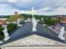 VILNIUS, LITHUANIA - JUNE 03, 2016: Vilnius Cathedral and Roof of it with Three Statues Saint Casimir, Saint Stanislaus, Saint He