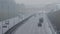 VILNIUS, LITHUANIA - SEPTEMBER 30, 2015: automobiles cars drive on foggy city road on September 30, 2015 in Vilnius