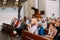 Vilnius, Lithuania. Woman parishioner praying in Cathedral Basilica