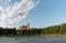 VILNIUS, LITUANIA - JULY 27, 2018: Vilnius Lukiskes Square with Park and Flag in Background