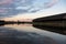 Vilvoorde, Flemish Brabant Region, Belgium - Reflection of abandoned and active industrial plants and warehouses in the canal