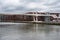 Vilvoorde, Flemish Brabant Region - Belgium - Small pedestrian bridge over the canal with contemporary apartment blocks in the