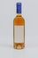 Vin santo wine in super bordeaux style bottle on white surface and background