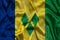 Vincent and the Grenadines national flag background with fabric texture. Flag of Vincent and the Grenadines waving in the wind. 3D