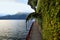 Vine covered walkway along Lake Como in Varenna Italy