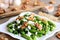 Vinegar and oil green bean salad recipe. Delicious green string beans salad with cottage cheese, peeled walnuts, garlic and spices