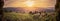 Vineyard landscape panorama in Tuscany, Italy. Wine farm at sunset