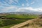 Vineyard landscape surrounded by hills on a sunny day