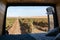 Vineyard view from inside a sel converted camper van living van life in Alentejo, Portugal