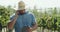 Vineyard, walking and man with tablet, phone call and consulting on farming order, agriculture or field harvest