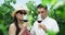 Vineyard, wine tasting and couple in nature drinking an alcohol beverage in summer. Farm, adventure and young people