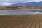 Vineyards in Laguardia. Vineyards and lagoon with Laguardia in the background, Alava, Euskadi