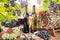 Vineyards at sunset in autumn harvest. Ripe grapes in fall, Wine bottle, glass of wine and grapes. white and red wine on an old