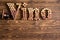 Vino cork letters with bottle of wine on wood