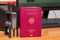 Vinous biometric passport of a German citizen with a border date stamper, close-up. Inscription - European Union, Federal Republic