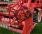 Vintage agricultural combine harvester at show.