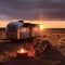 Vintage Airstream Trailer Parked in the Middle of a Sprawling Prairie Landscape with Sunset View