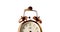 Vintage alarm clock with spinning hand on clock face on white background.