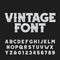 Vintage alphabet font. Scratched bold letters and numbers in Wild West style.