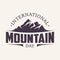 Vintage amblem letter International Mountain Day