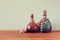 Vintage antigue perfume bottles, on wooden table. retro filtered image