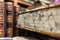 Vintage, antiquarian books pile on wooden surface