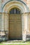 vintage antique arched door. Old stone church or temple