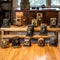Vintage antique cameras on a wooden shelf in a home interior