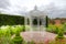 Vintage arbour in a garden.