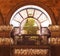 Vintage arched window with balcony at night decorated with many Christmas lights