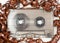 Vintage audio cassette with messed up audio tape