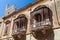 Vintage balconies of Mdina, fortified old city of Malta