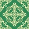 Vintage baroque ornament, damask floral seamless pattern, vector illustration. Light yellow oriental tracery on green background,