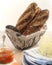 Vintage Basket with french baguettes with seeds and cereals