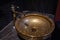 Vintage Beautiful faucet and golden mixer tap on a marble round sink in the bathroom. Interior of an expensive toilet