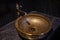 Vintage Beautiful faucet and golden mixer tap on a marble round sink in the bathroom. Interior of an expensive toilet