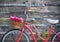 Vintage bicycle with basket with peony flowers