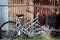 Vintage bike abandoned by steel wall;