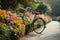 Vintage bike transformed into a floral arrangement amidst a vivid display of garden blooms