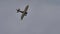 Vintage biplane of First World War WWI in grey heavy rain cloudy sky. Copy space