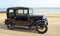 Vintage Black Car parked on seafront promenade