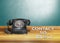 Vintage black dial telephone with email sign