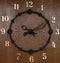 Vintage Black Steel Large Arabic Numeral Clock in Wooden Wall