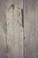 Vintage bleached wood rustic background with cracks on old bleached wooden surface