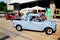 Vintage blue Austin mini van driving backwards for parking for meeting of mini family club Thailand at Bangkok, Thailand.