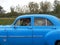 VINTAGE BLUE CAR ON THE HIGHWAY, CUBA