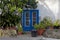 Vintage blue door with flowerpots in Kakopetria village, Cyprus