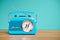 Vintage blue radio receiver on wood table. Wallpaper 3d