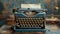 Vintage Blue Typewriter on Wooden Table