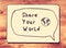 Vintage board with the phrase share your world written on it. retro filtered image